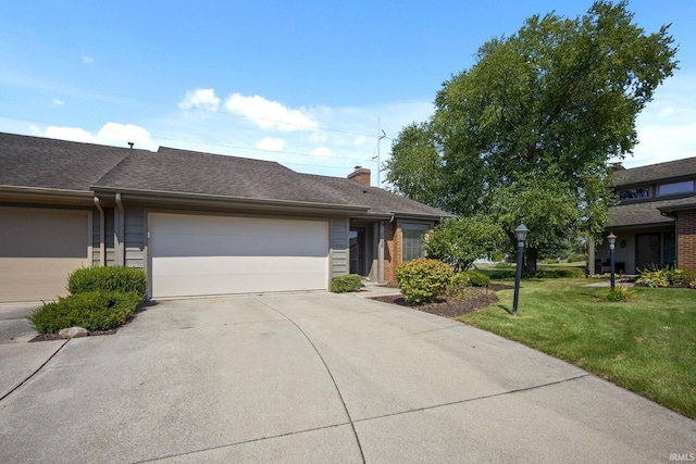 single story home with a garage and a front yard