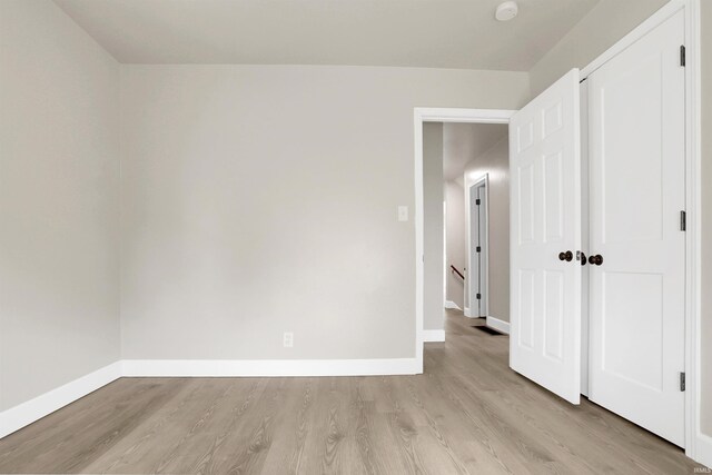 unfurnished bedroom with light hardwood / wood-style flooring