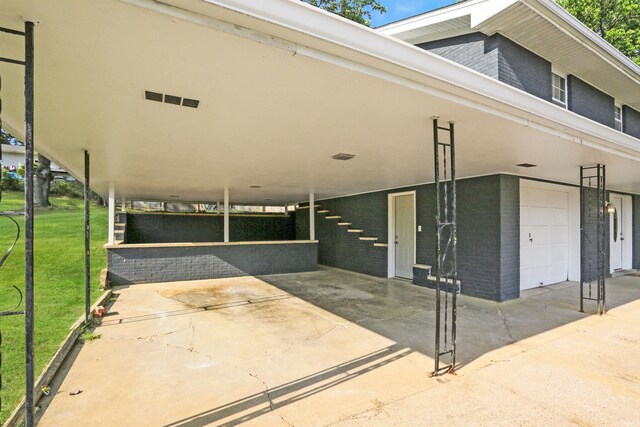 exterior space with a garage