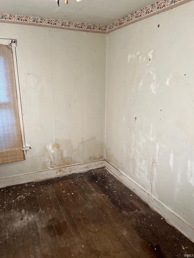 empty room with wood-type flooring