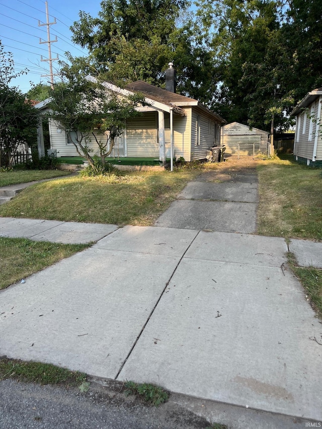 view of property exterior featuring a lawn