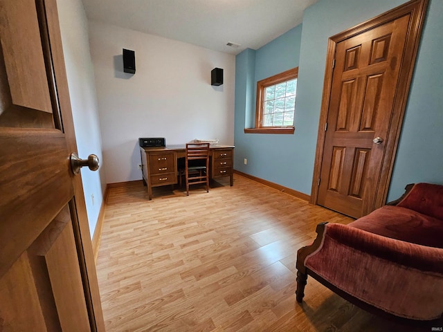 sitting room with light hardwood / wood-style floors