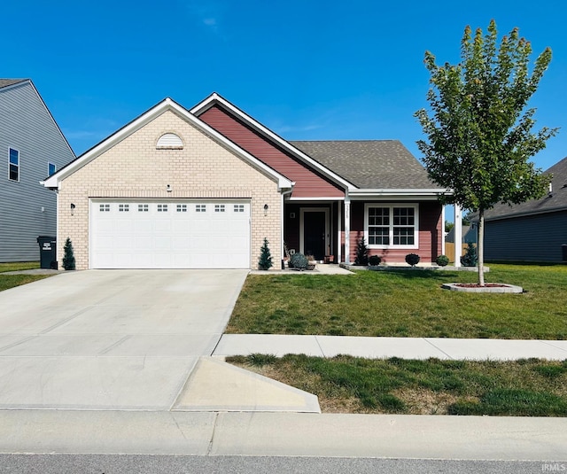 view of front of home featuring a garage and a front yard