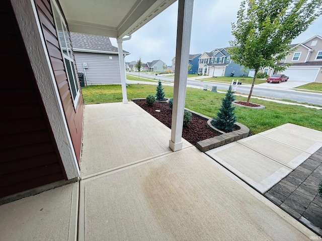 view of patio with a garage