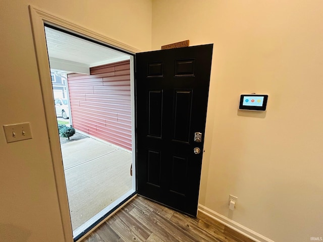 entrance foyer featuring wood-type flooring