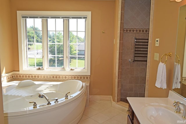 bathroom with vanity, independent shower and bath, and tile patterned floors