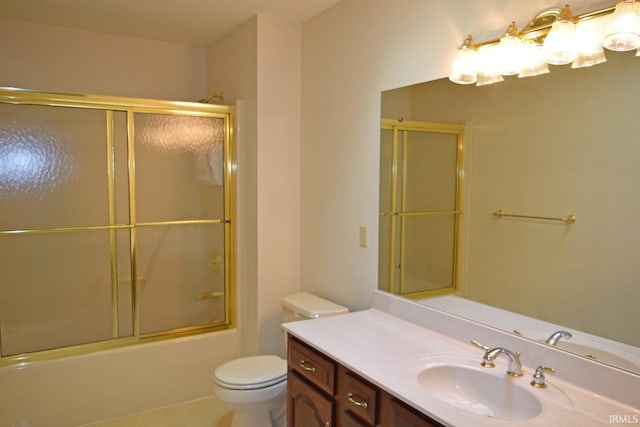 full bathroom with vanity, toilet, tile patterned floors, and enclosed tub / shower combo