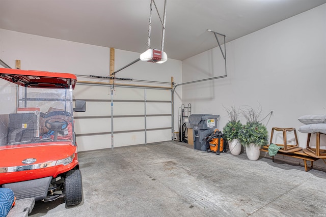 garage featuring a garage door opener