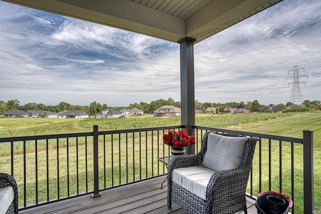 deck featuring a lawn