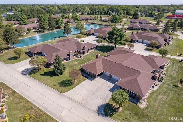 aerial view with a water view and a residential view