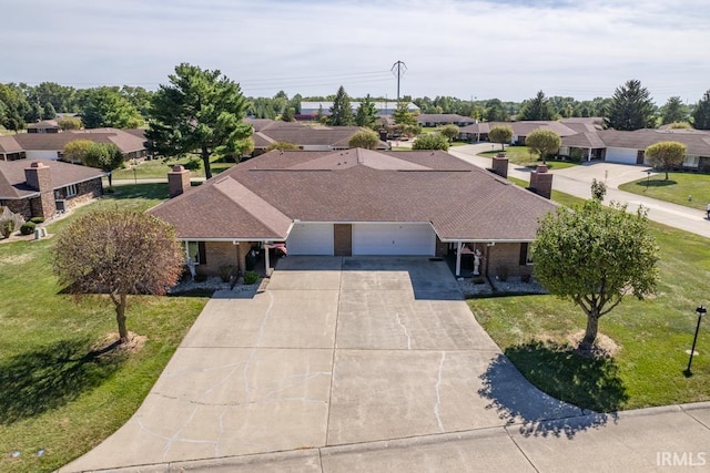 birds eye view of property with a residential view