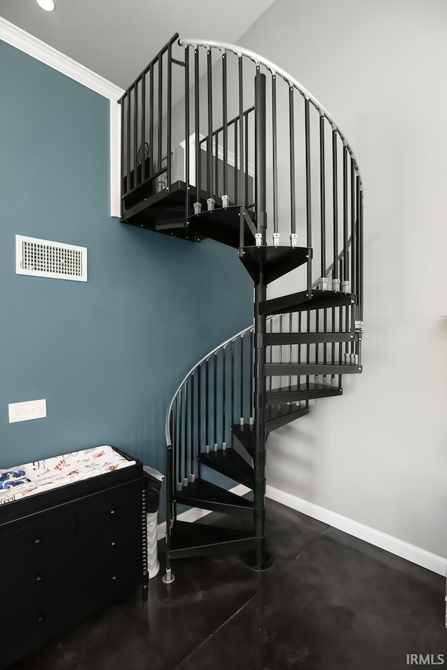 16084 County Road 20, Goshen, IN 46528 - staircase featuring baseboards, visible vents, crown molding, and concrete flooring