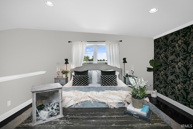 carpeted bedroom featuring vaulted ceiling