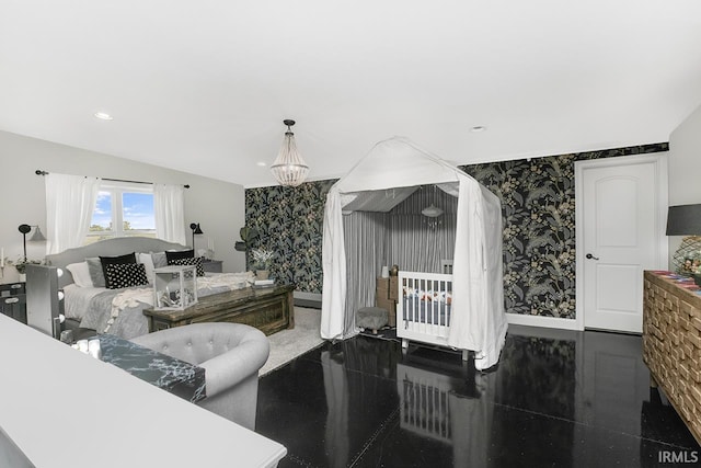 bedroom featuring a notable chandelier