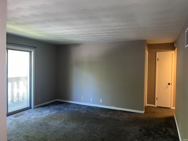 unfurnished room with carpet flooring