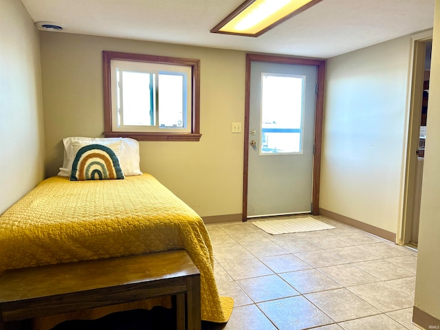 unfurnished bedroom featuring light tile patterned floors