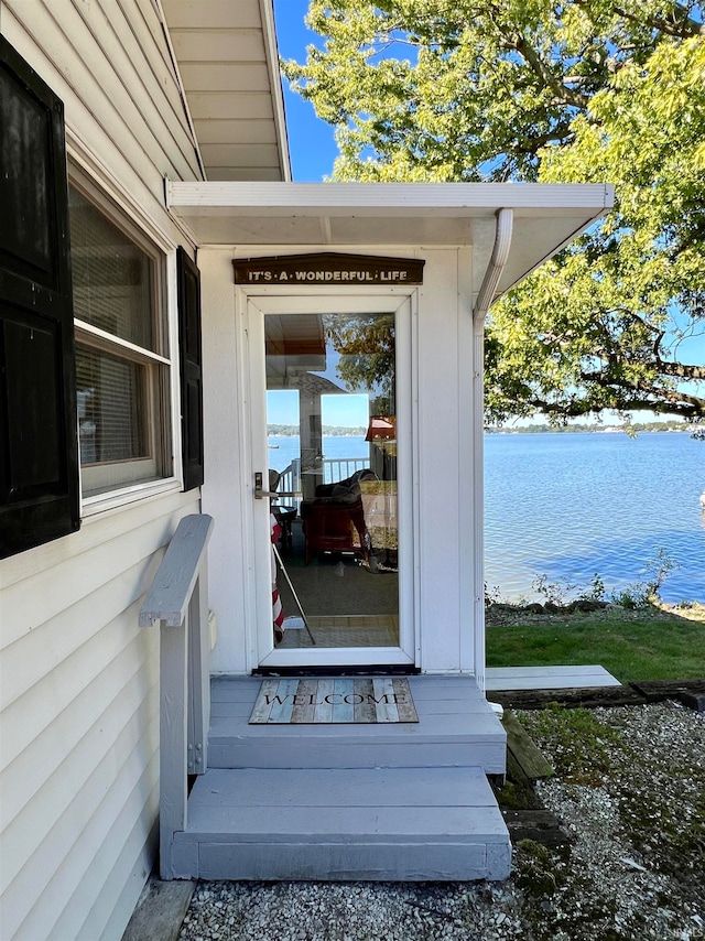 property entrance with a water view