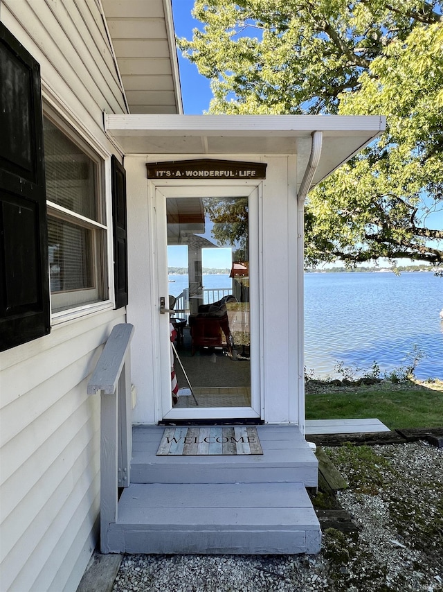 property entrance featuring a water view