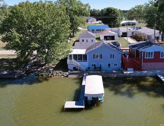 aerial view with a residential view and a water view