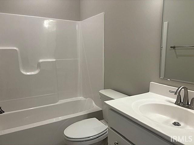 full bath with vanity, toilet, and tub / shower combination