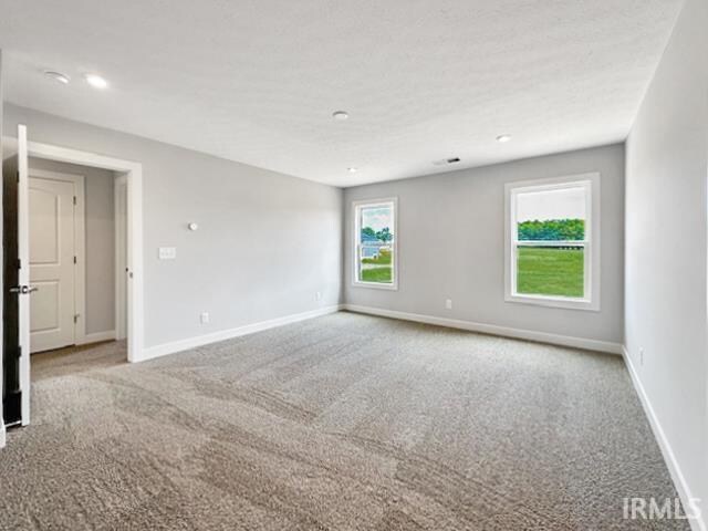 empty room with carpet floors