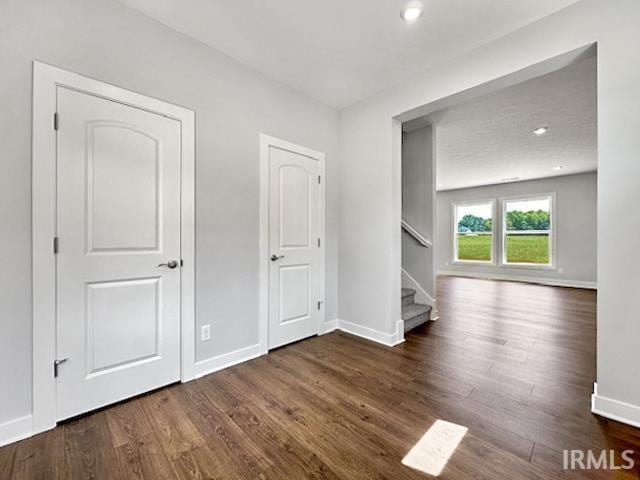 empty room featuring dark hardwood / wood-style floors