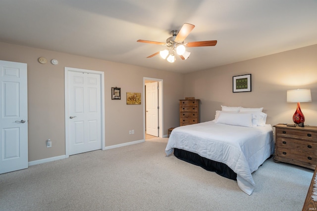 carpeted bedroom with ceiling fan