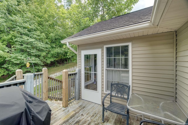 wooden deck featuring grilling area