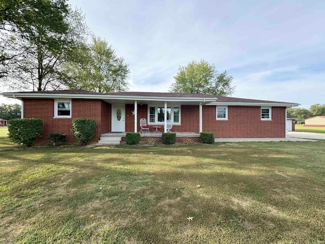 ranch-style house with a front yard