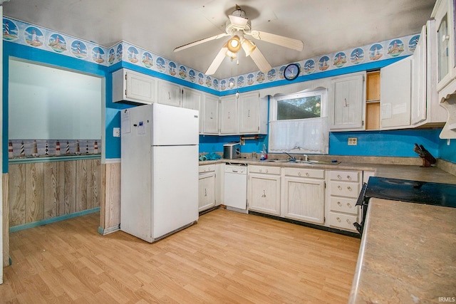 kitchen with white appliances, sink, ceiling fan, white cabinets, and light hardwood / wood-style floors