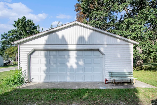 garage with a lawn