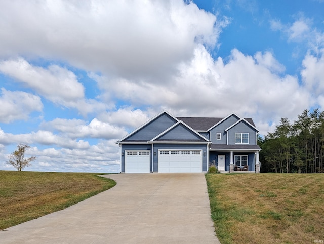 view of front of property featuring a garage, a porch, concrete driveway, and a front yard