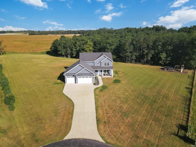 birds eye view of property featuring a rural view