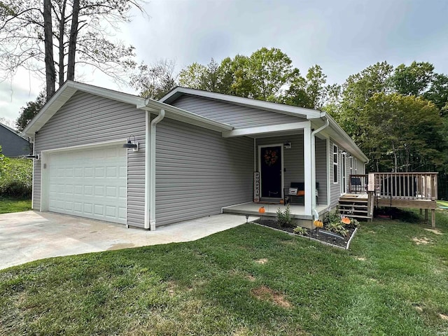 view of front of home featuring a garage and a front yard