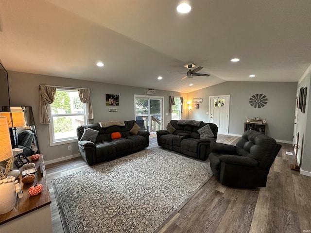 living room with lofted ceiling, wood-type flooring, and ceiling fan