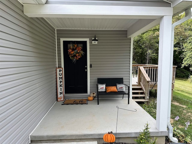 doorway to property featuring a porch