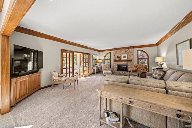 living room with carpet flooring, ornamental molding, and a fireplace