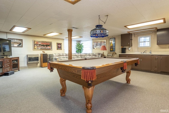 game room featuring heating unit, light colored carpet, visible vents, a sink, and billiards