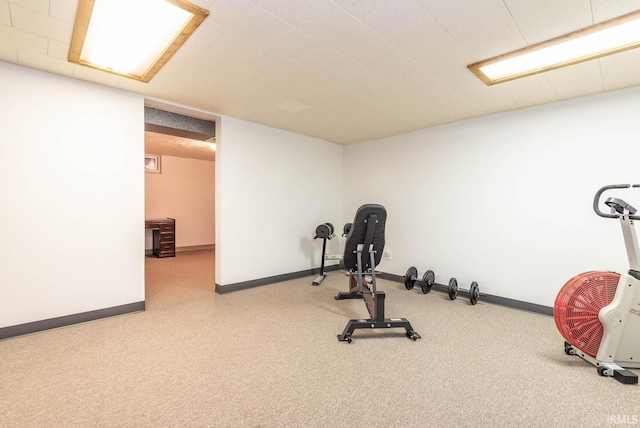 exercise room with baseboards