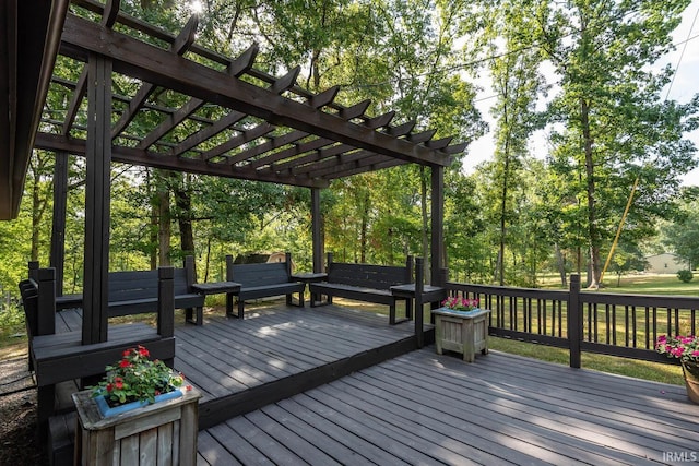 wooden deck with a pergola