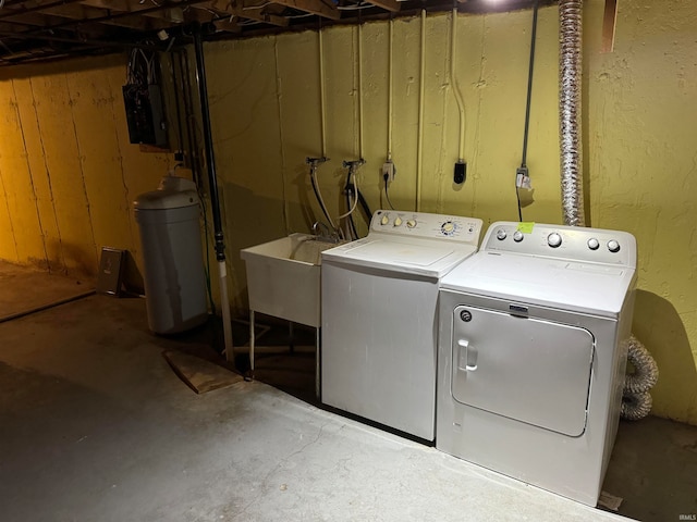 laundry room with independent washer and dryer, wood walls, and electric panel