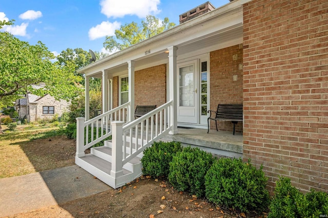 entrance to property with covered porch