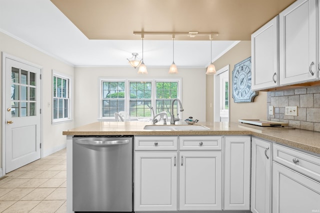 kitchen with crown molding, white cabinetry, tasteful backsplash, dishwasher, and sink