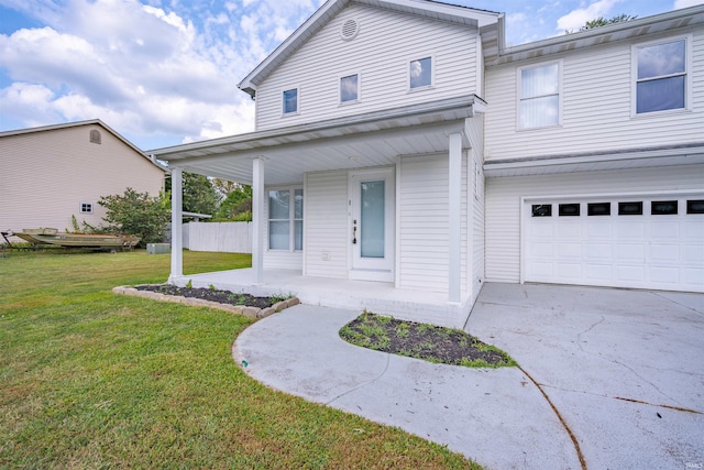 view of front facade with a garage and a front yard