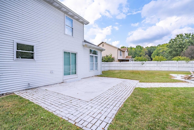 view of patio featuring fence