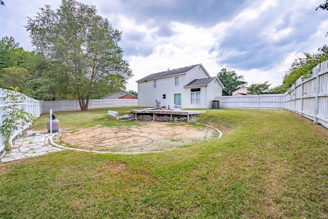 view of yard with a fenced backyard