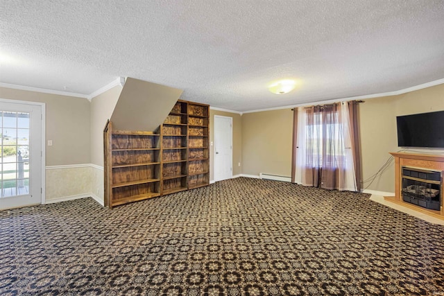 unfurnished living room with a baseboard radiator, carpet floors, and a textured ceiling