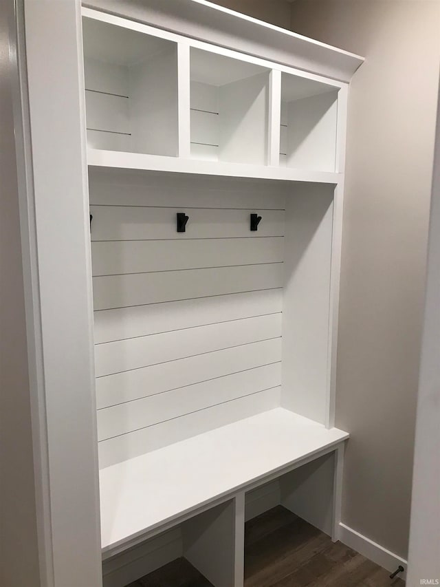 mudroom featuring dark wood-style floors