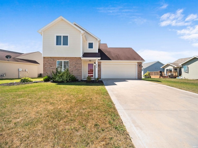 view of front of property featuring a front yard and a garage