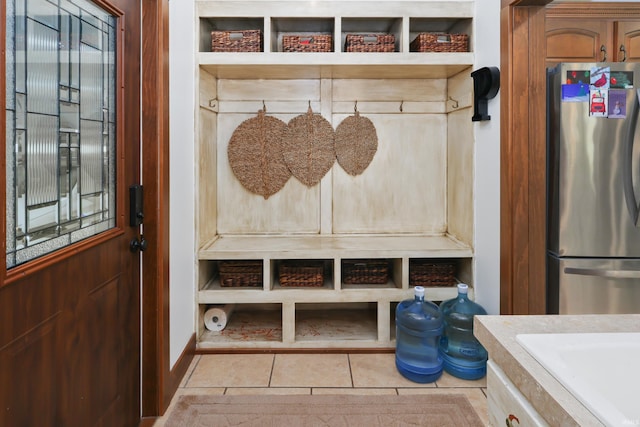 mudroom featuring light tile patterned flooring